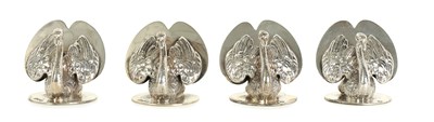 Lot 398 - A SET OF FOUR LATE 19TH CENTURY SILVER SWAN MENU HOLDERS