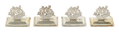 Lot 370 - A SET OF FOUR LATE 19TH CENTURY SILVER GALLEON MENU HOLDERS