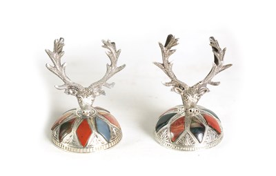 Lot 349 - A PAIR OF SCOTTISH SILVER AND AGATE STAG'S HEAD MENU HOLDERS