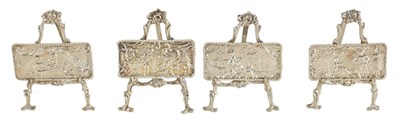 Lot 323 - A SET FOUR LATE VICTORIAN SILVER EASEL MENU HOLDERS