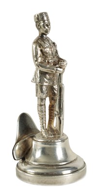 Lot 460 - A CAST SILVER FIGURAL MENU HOLDER