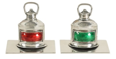 Lot 374 - AN UNUSUAL PAIR OF SILVER MENU HOLDERS IN THE FORM OF PORT AND STARBOARD SHIPS LAMPS