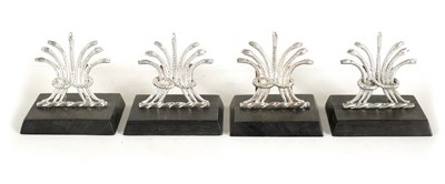 Lot 369 - A SET OF FOUR LATE VICTORIAN SILVER MENU HOLDERS