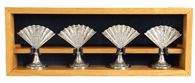 Lot 360 - A CASED SET OF FOUR LATE VICTORIAN NOVELTY SILVER MENU HOLDERS MODELLED AS FANS