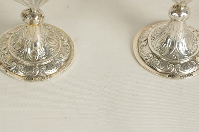 Lot 360 - A CASED SET OF FOUR LATE VICTORIAN NOVELTY SILVER MENU HOLDERS MODELLED AS FANS