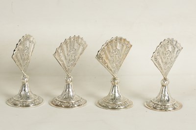 Lot 360 - A CASED SET OF FOUR LATE VICTORIAN NOVELTY SILVER MENU HOLDERS MODELLED AS FANS