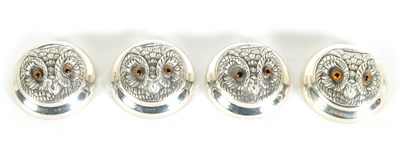 Lot 465 - A SET OF FOUR SILVER OWL’S HEADS MENU HOLDERS