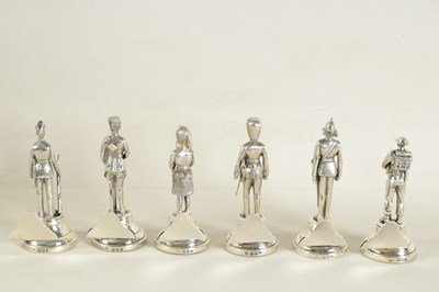 Lot 448 - A CASED SET OF SIX MILITARY FIGURE CAST SILVER MENU HOLDERS