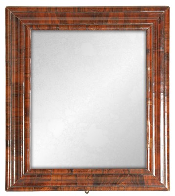 Lot 984 - A WILLIAM AND MARY CUSHION MOULDED WALNUT HANGING MIRROR