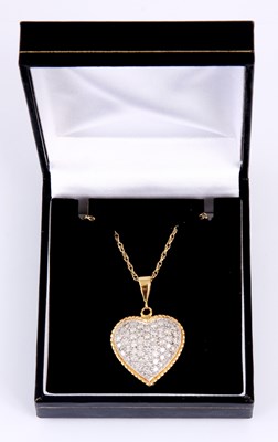 Lot 96 - AN 18ct GOLD AND DIAMOND SET HEART SHAPED...