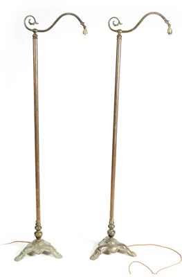 Lot 524 - A PAIR OF EARLY 20TH CENTURY PATINATED BRASS OFFICER'S STANDARD LAMPS
