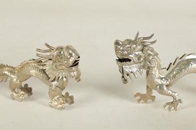 Lot 147 - A SET OF TEN LATE 19TH CENTURY CHINESE SILVER DRAGON MENU HOLDERS