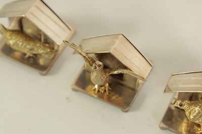 Lot 373 - A FINE CASED SET OF SIX SILVER GILT DOVE MENU HOLDERS