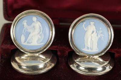 Lot 450 - A CASED SET OF FOUR WEDGWOOD SILVER MENU HOLDERS