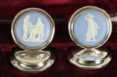 Lot 450 - A CASED SET OF FOUR WEDGWOOD SILVER MENU HOLDERS