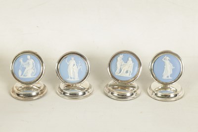 Lot 450 - A CASED SET OF FOUR WEDGWOOD SILVER MENU HOLDERS