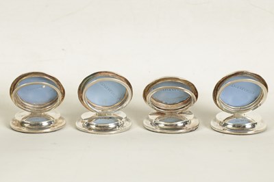 Lot 450 - A CASED SET OF FOUR WEDGWOOD SILVER MENU HOLDERS