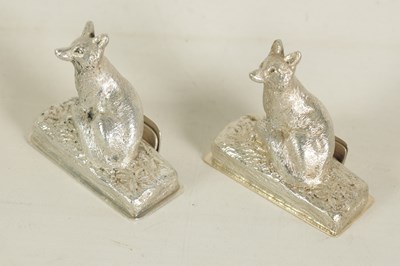 Lot 416 - A PAIR OF CAST SILVER FOX MENU HOLDERS