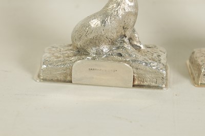 Lot 416 - A PAIR OF CAST SILVER FOX MENU HOLDERS