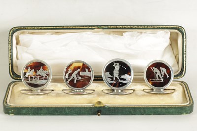 Lot 412 - A CASED SET OF FOUR SILVER AND TORTOISESHELL SPORTING SCENE MENU HOLDERS