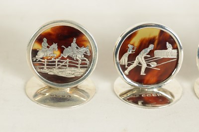 Lot 412 - A CASED SET OF FOUR SILVER AND TORTOISESHELL SPORTING SCENE MENU HOLDERS