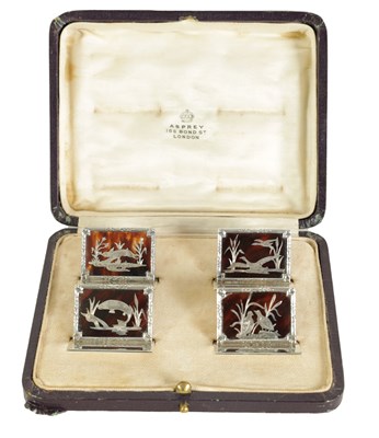 Lot 462 - A CASED SET OF FOUR SILVER AND TORTOISESHELL COUNTRY SPORTS MENU HOLDERS