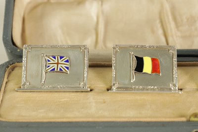 Lot 340 - A CASED SET OF FOUR SILVER AND ENAMEL FLAG MENU HOLDERS