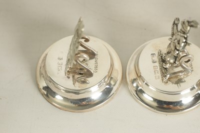 Lot 351 - A CASED SET OF FOUR SILVER 'ALICE IN WONDERLAND' MENU HOLDERS