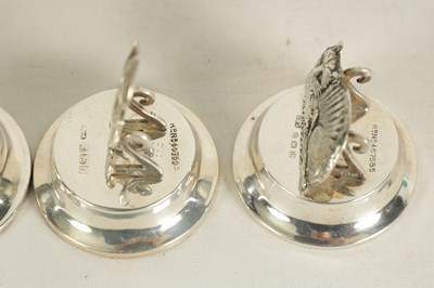 Lot 351 - A CASED SET OF FOUR SILVER 'ALICE IN WONDERLAND' MENU HOLDERS