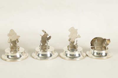 Lot 351 - A CASED SET OF FOUR SILVER 'ALICE IN WONDERLAND' MENU HOLDERS