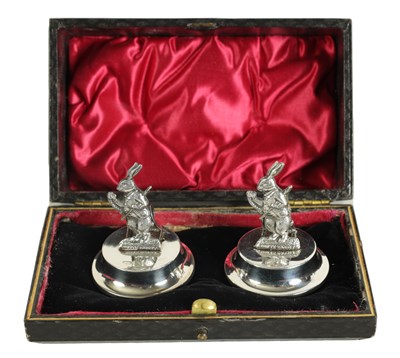 Lot 471 - A PAIR OF SILVER 'ALICE IN WONDERLAND' MENU HOLDERS