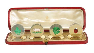 Lot 377 - A RARE SET OF SILVER GILT AND ENAMEL 'LUCKY' MOTIF MENU HOLDERS