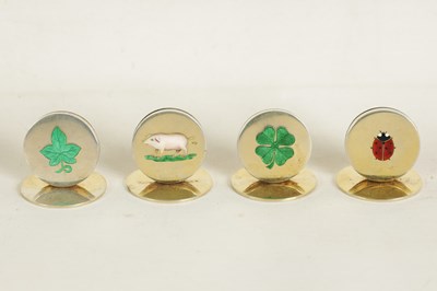 Lot 377 - A RARE SET OF SILVER GILT AND ENAMEL 'LUCKY' MOTIF MENU HOLDERS