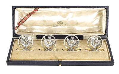 Lot 385 - A CASED SET OF FOUR SCOTTISH THISTLE MENU HOLDERS