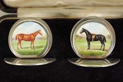 Lot 430 - A FINE CASED SET OF FOUR SILVER AND ENAMEL HORSE MENU HOLDERS