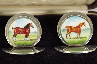 Lot 430 - A FINE CASED SET OF FOUR SILVER AND ENAMEL HORSE MENU HOLDERS