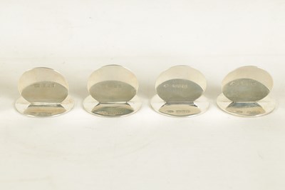 Lot 430 - A FINE CASED SET OF FOUR SILVER AND ENAMEL HORSE MENU HOLDERS