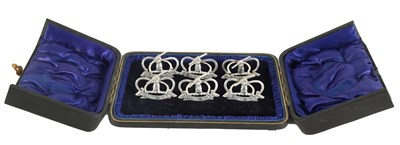 Lot 469 - A CASED SET OF SIX LATE VICTORIAN SILVER MENU HOLDERS