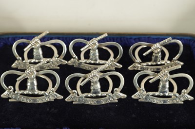 Lot 469 - A CASED SET OF SIX LATE VICTORIAN SILVER MENU HOLDERS