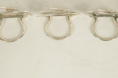 Lot 469 - A CASED SET OF SIX LATE VICTORIAN SILVER MENU HOLDERS