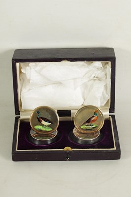 Lot 399 - A FINE CASED PAIR OF SILVER GILT AND ENAMEL GAME BIRD MENU HOLDERS