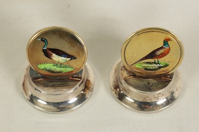 Lot 399 - A FINE CASED PAIR OF SILVER GILT AND ENAMEL GAME BIRD MENU HOLDERS