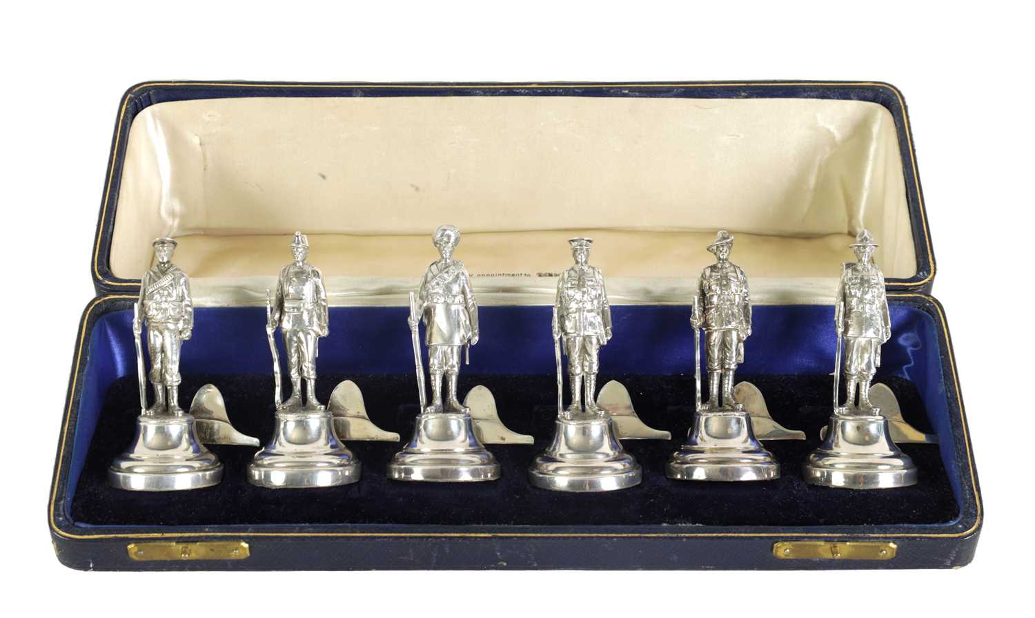 Lot 401 - A LARGE AND RARE CASED COMPLETE SET OF SIX SILVER 'SOLDIERS OF THE EMPIRE' FIGURAL MENU HOLDERS