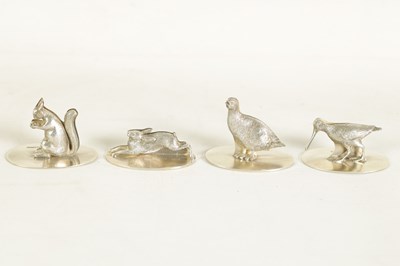 Lot 415 - A CASED SET OF FOUR SILVER ANIMALIER MENU HOLDERS