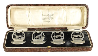 Lot 376 - A CASED SET OF FOUR SILVER FOX AND HOUNDS MENU HOLDERS