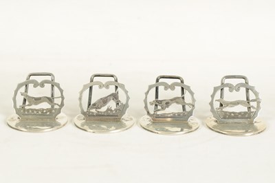 Lot 376 - A CASED SET OF FOUR SILVER FOX AND HOUNDS MENU HOLDERS