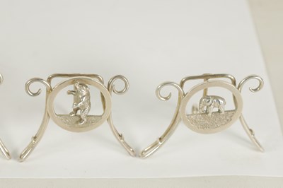 Lot 477 - A FINE SET OF SIZE SILVER ANIMALIER MENU HOLDERS