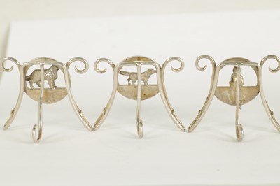 Lot 477 - A FINE SET OF SIZE SILVER ANIMALIER MENU HOLDERS