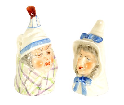 Lot 35 - TWO ROYAL WORCESTER “MR AND MRS CAUDLE” CANDLE EXTINGUISHERS