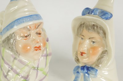 Lot 35 - TWO ROYAL WORCESTER “MR AND MRS CAUDLE” CANDLE EXTINGUISHERS